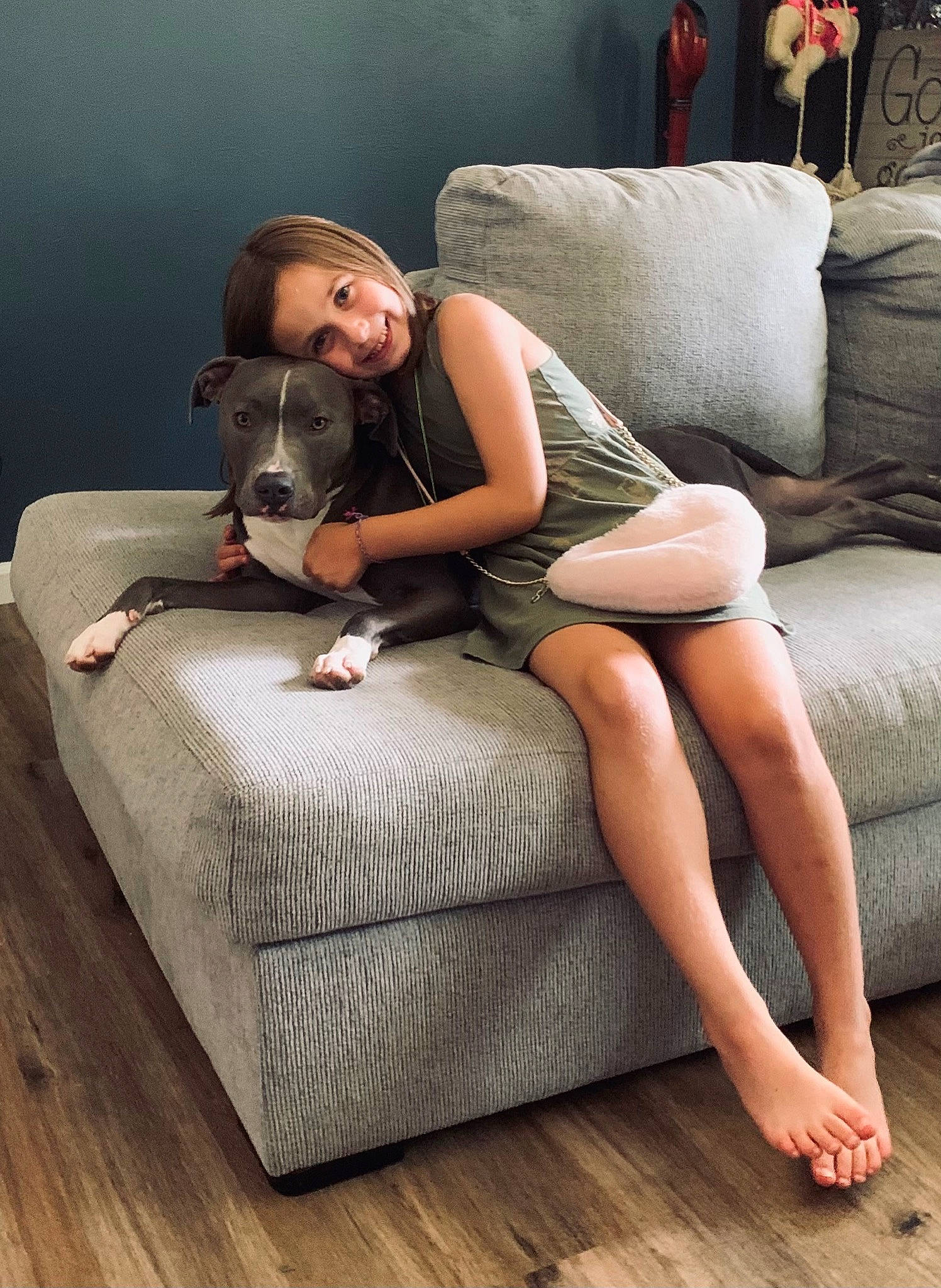 Goliath joined the competition — help win amazing prizes! beauty, carnivore, comfort, couch, flash_photography, floor, flooring, hair, hardwood, human_body, interior_design, joint, knee, leg, living_room, shoulder, textile, thigh, waist, wood