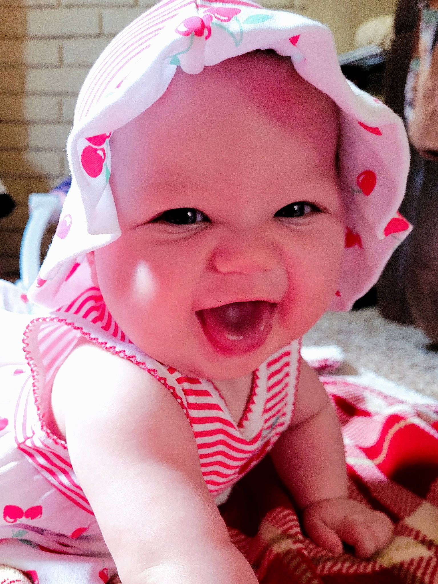Gianna is registered to the contest to win money with this photo: baby, baby_laughing, baby_toddler_clothing, cheek, child, event, fashion_accessory, fun, happy, hat, headgear, headwear, laugh, lip, magenta, mouth, person, pink, skin, smile