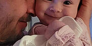Amayah joined the competition — help win amazing prizes! baby, man, smile, face, closeup, indoor, affection, pajamas, person, head, hand, clothing, holding, portrait, cute, love, family, tender, warmth, skin