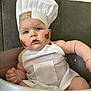 Leandro a rejoint le concours — aidez-le/la à gagner de superbes lots ! baby, child, chef_hat, apron, chocolate, face_paint, blue_eyes, curious, cute, chubby, sitting, indoors, portrait, infant, costume, white_clothing, smudged_face, funny, expression, cooking_theme