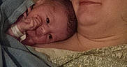 Harmony is registered to the contest to win money with this photo: adult, baby, bed, blanket, child, comfort, cozy, face, family, human, indoor, love, newborn, parent, person, portrait, rest, skin, sleepy, tired