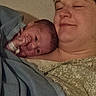 Harmony is registered to the contest to win money with this photo: baby, adult, blanket, bed, cozy, family, face, person, sleepy, newborn, portrait, human, skin, comfort, indoor, parent, child, love, rest, tired
