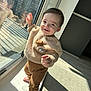 Gabriel is registered to the contest to win money with this photo: toddler, child, smile, barefoot, reflection, window, sunlight, indoor, pants, sweater, cozy, happy, face, person, floor, shadow, light, hand, home