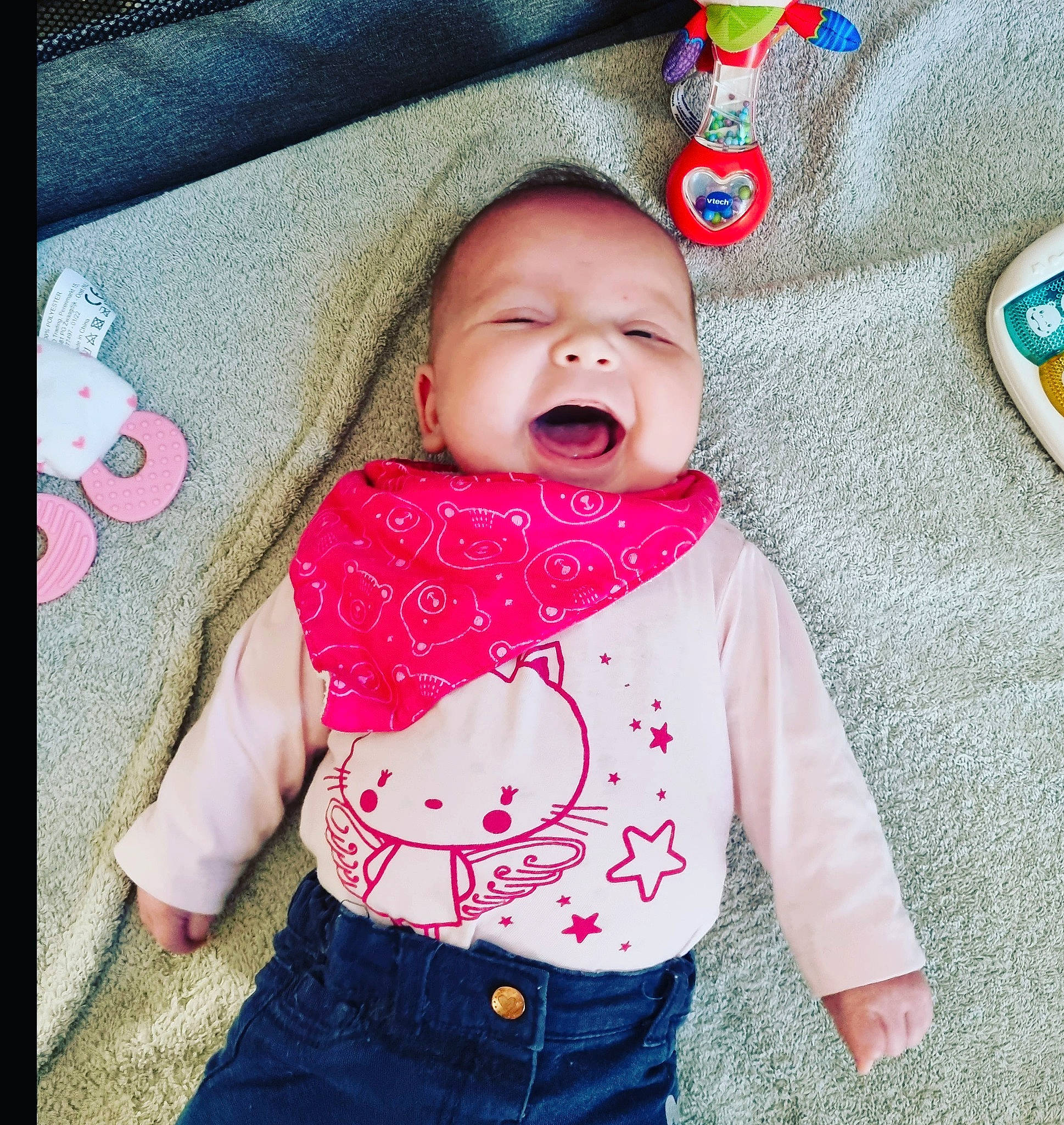 Maddy a rejoint le concours — aidez-le/la à gagner de superbes lots ! baby, baby_toddler_clothing, cheek, child, comfort, cool, eye, happy, human_body, lip, mouth, nose, outerwear, person, pink, red, skin, sleeve, textile, toddler