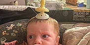 Uriah joined the competition — help win amazing prizes! baby, pacifier, blanket, indoor, child, face, expression, kitchen, furniture, wrapped, headwear, comfort, young, person, couch, soft, household, infant, warm, cute