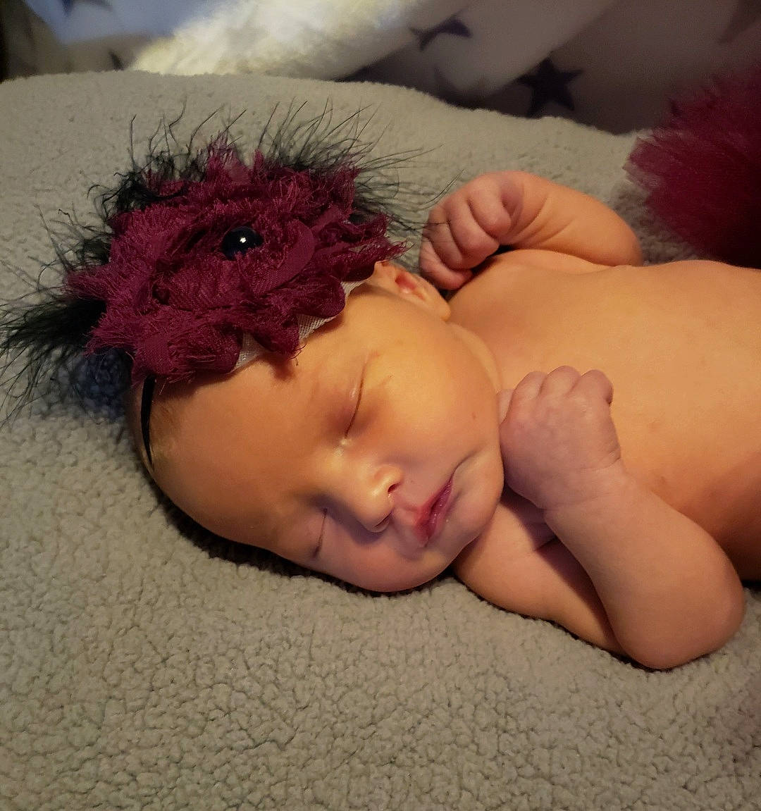 Eryn is registered to the contest to win money with this photo: arm, baby_sleeping, cap, chin, comfort, eye, eyebrow, eyelash, forehead, hair, hand, head, headgear, human_body, iris, lip, mouth, neck, person, skin