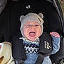baby, bear_ears, blanket, car_seat, child, child_in_stroller, cozy, cute, face, happy, infant, knit_hat, outdoor, person, portrait, smiling, straps, stroller, sweater, warm_clothing