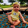 baby, child, cute, grass, happy, headband, infant, nature, outdoor, park, playground, portrait, rope_swing, smiling, summer, sunny, swing, trees, wood_chips, yellow_clothing