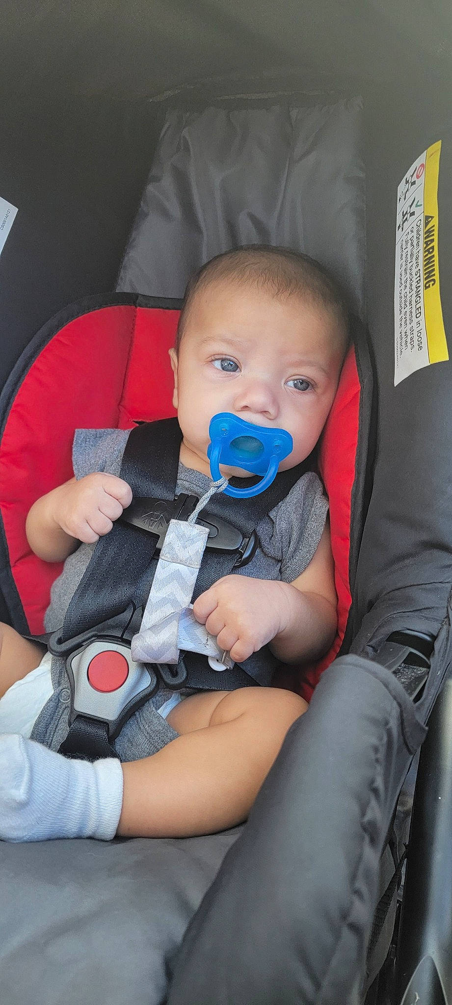 Gideon joined the competition — help win amazing prizes! auto_part, baby, baby_carriage, baby_products, baby_toddler_clothing, car_seat, chair, cheek, child, comfort, electric_blue, finger, lap, nail, person, product, seat_belt, sitting, skin, thumb