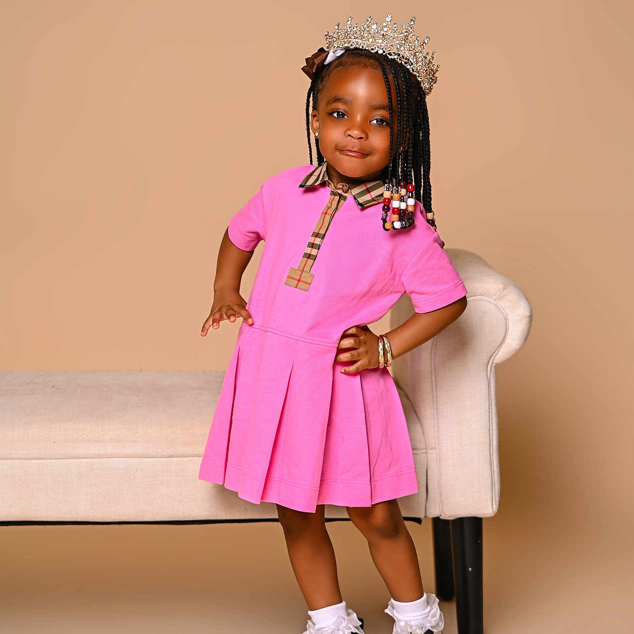 Emoni is registered to the contest to win money with this photo: accessories, bodypart, child, clothing, coat, dress, face, female, finger, footwear, formalwear, furniture, girl, hand, head, jewelry, person, photography, portrait, shoe