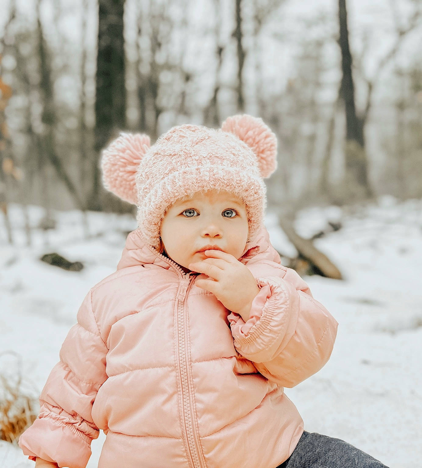 Maisie is registered to the contest to win money with this photo: baby, baby_toddler_clothing, cap, child, eye, flash_photography, freezing, fur, happy, headwear, knit_cap, lip, pattern, people_in_nature, person, pink, skin, sleeve, snow, toddler