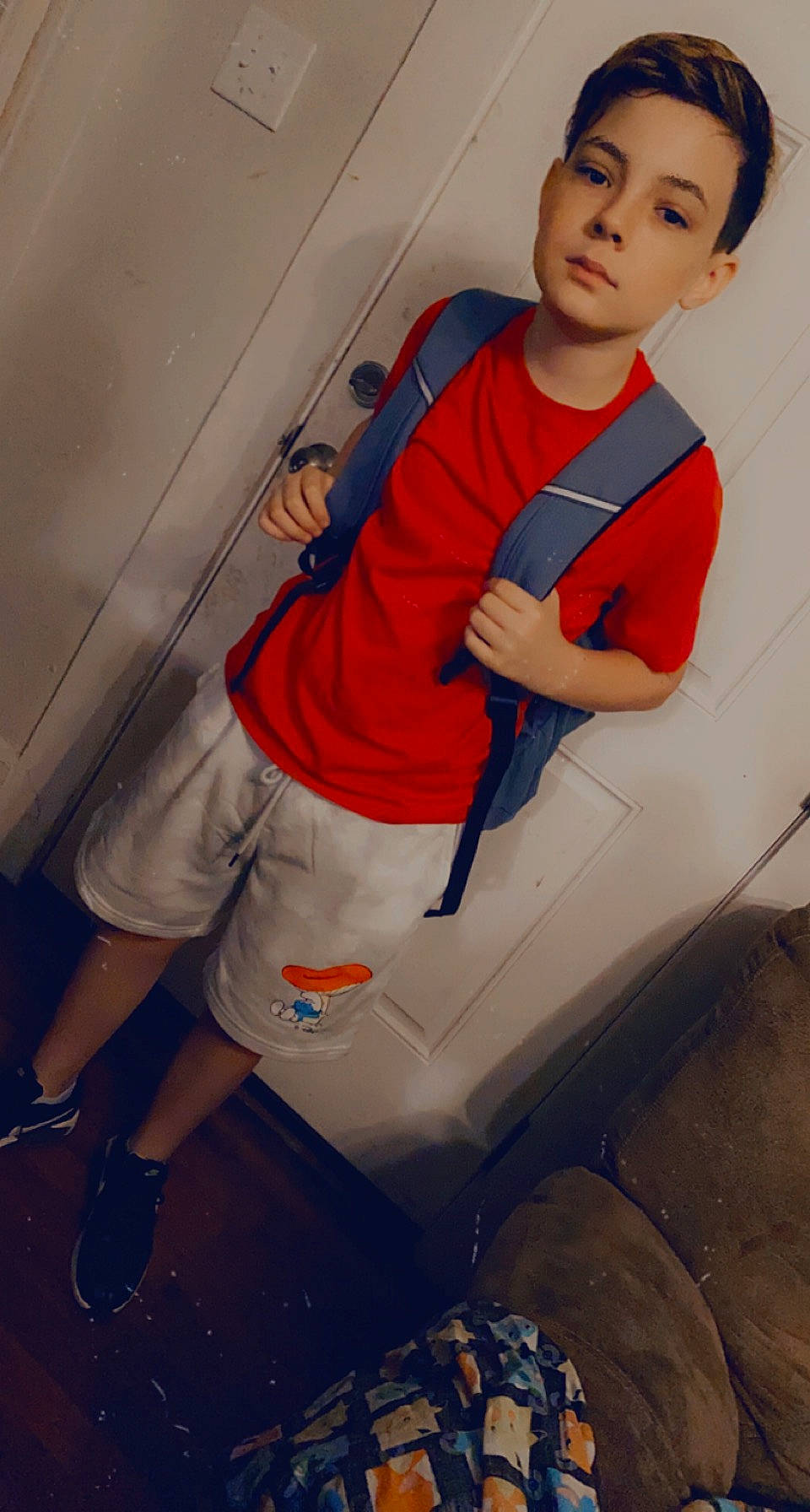 John is registered to the contest to win money with this photo: comfort, cool, elbow, eye, finger, footwear, human_body, knee, leg, leisure, mouth, orange, person, shoe, shorts, shoulder, sleeve, sportswear, t_shirt, thigh