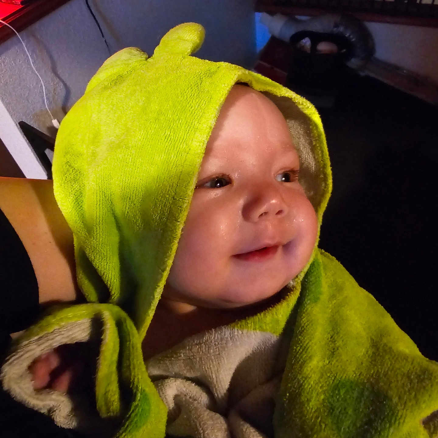 Lincoln is registered to the contest to win money with this photo: baby, bathtowel, blanket, bonnet, clothing, face, fashion, fleece, hat, head, hood, hoodie, knitwear, person, photography, portrait, shelf, sweater, sweatshirt, towel
