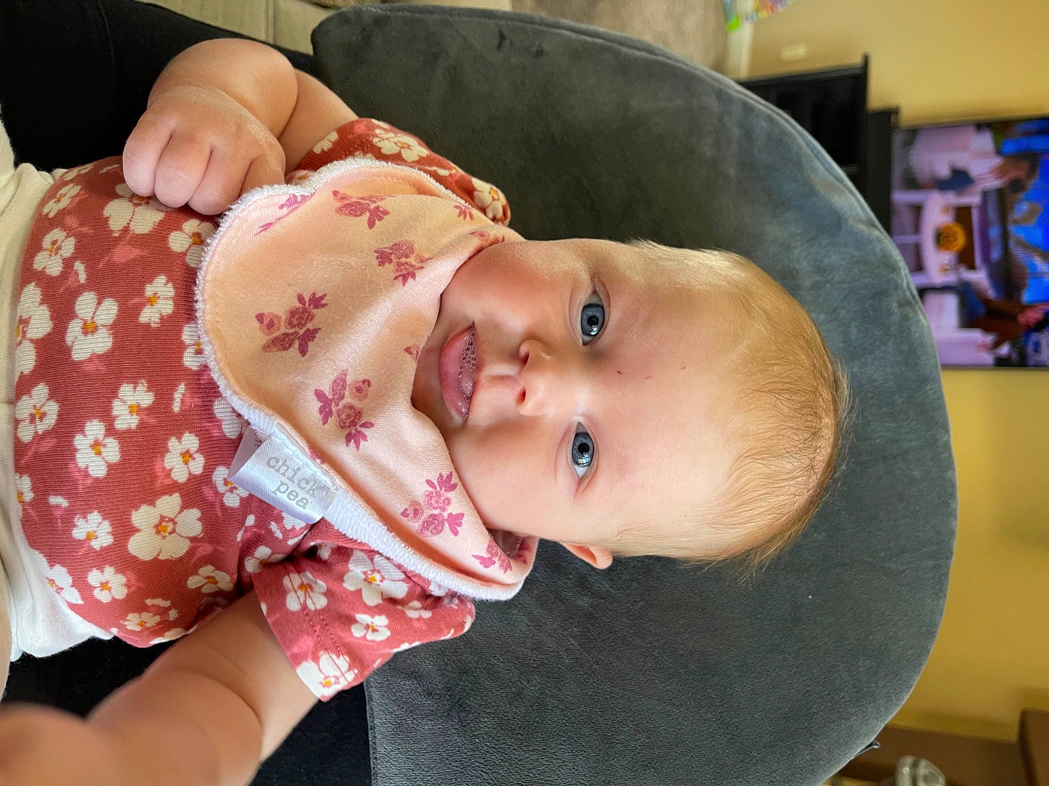 Everly is registered to the contest to win money with this photo: baby, baby_products, baby_toddler_clothing, cheek, child, ear, eyelash, fashion_accessory, fun, happy, hat, headgear, lip, mouth, nose, pattern, person, skin, sleeve, smile