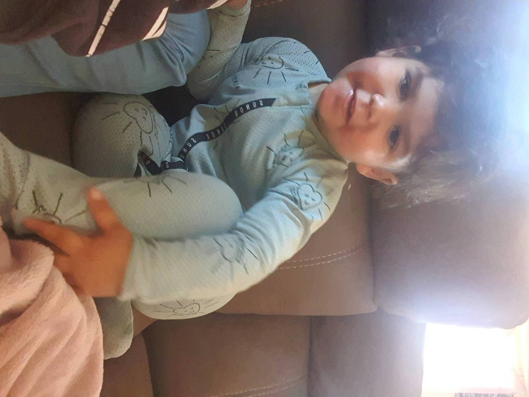 Jedediah is registered to the contest to win money with this photo: abdomen, chest, child, comfort, elbow, flash_photography, fun, fur, gesture, happy, human_leg, knee, linens, mouth, nap, person, room, sitting, skin, sleep