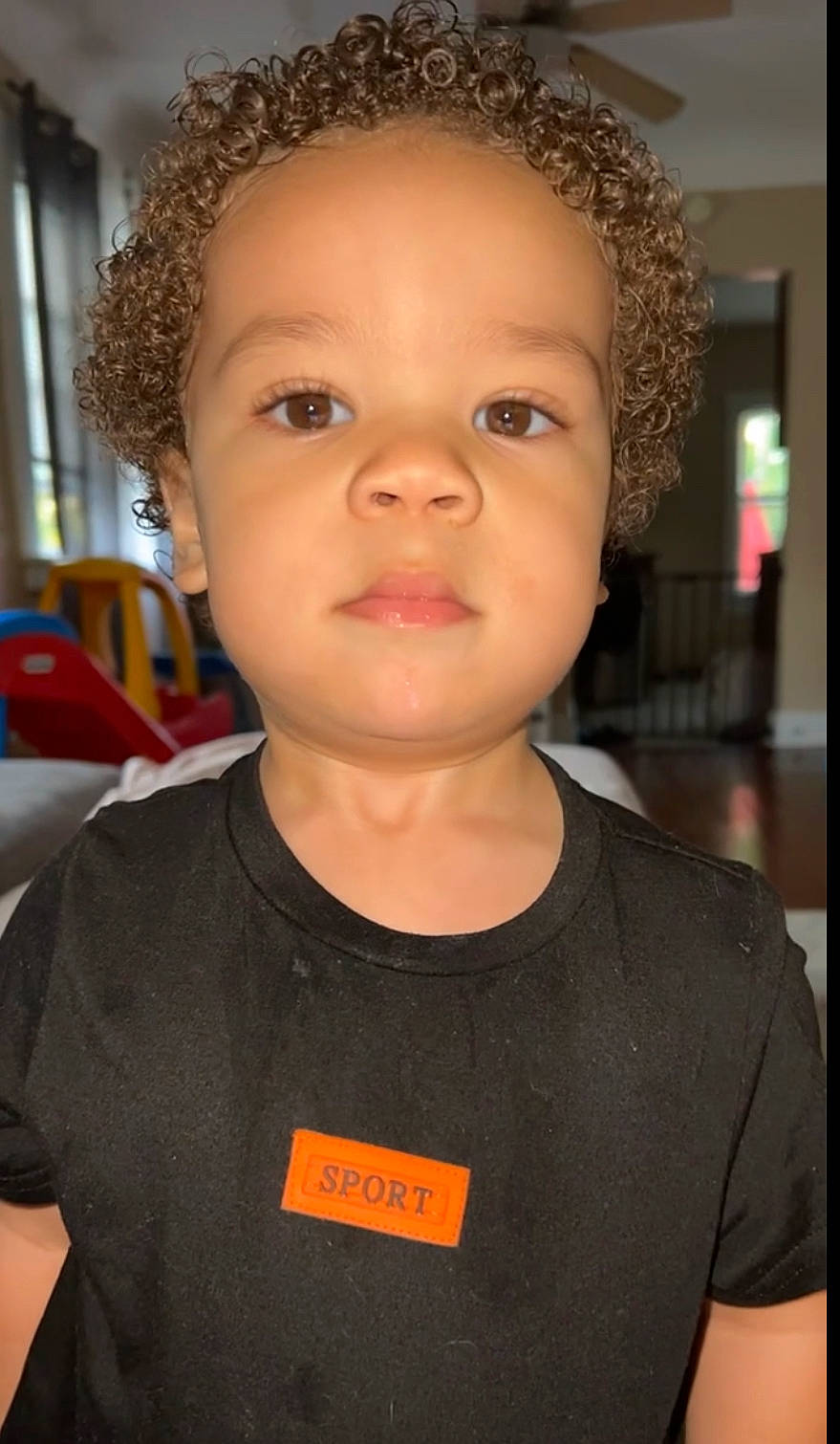 Kyren joined the competition — help win amazing prizes! afro, baby, chair, cheek, child, ear, eyebrow, eyelash, forehead, fun, happy, jheri_curl, lip, neck, nose, person, ringlet, t_shirt, toddler