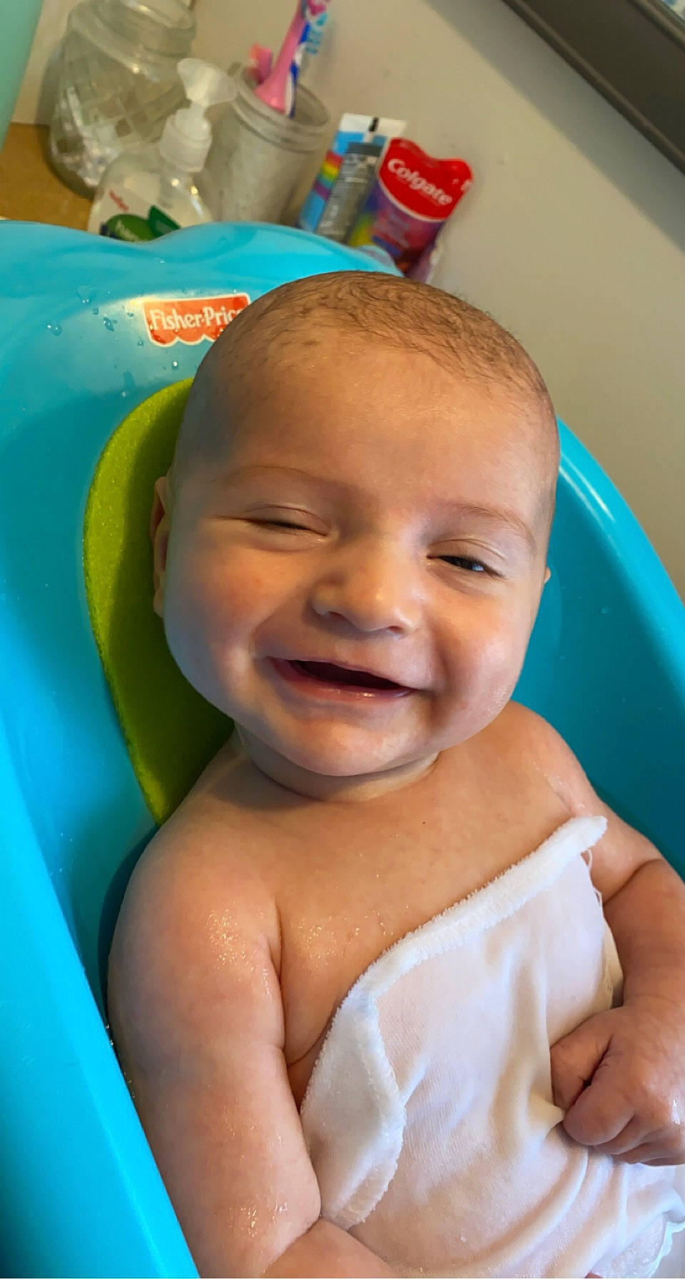 Maverick is registered to the contest to win money with this photo: baby, baby_bathing, bathing, blue, cheek, chest, chin, ear, eye, eyebrow, green, happy, head, iris, joy, leisure, mouth, nose, person, product