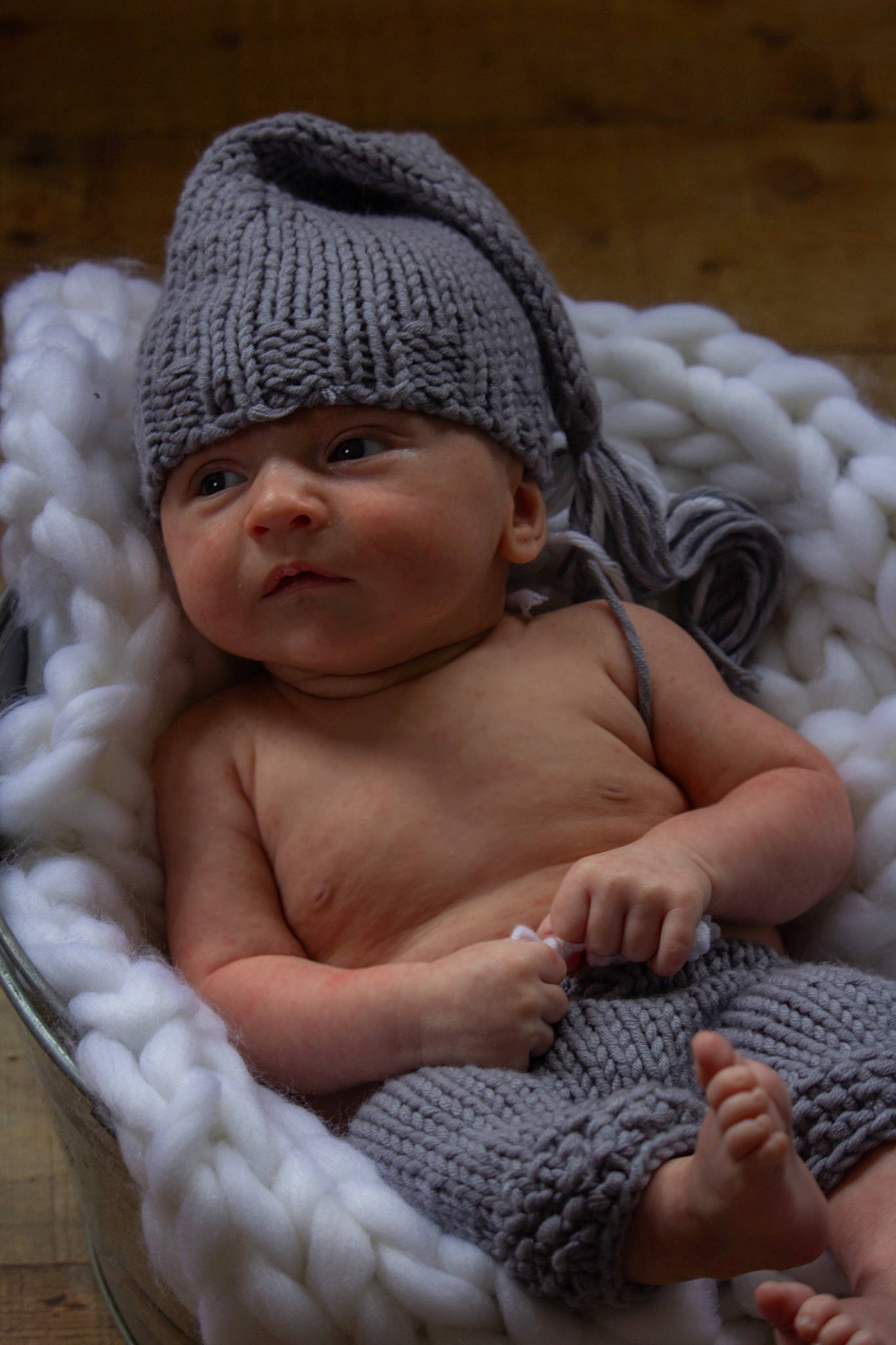 Maverick is registered to the contest to win money with this photo: baby, baby_sleeping, baby_toddler_clothing, cap, child, comfort, crochet, fashion_accessory, grass, headwear, knit_cap, linens, mammal, person, sitting, skin, thumb, toddler, vertebrate, wood
