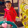 Ashanti Singleton is registered to the contest to win money with this photo: child, toddler, playground, red_dress, heart_design, outdoor, sunny, play_equipment, yellow, green, brick_wall, person, cute, happy, daylight, smiling, small_child, fun, playing, casual