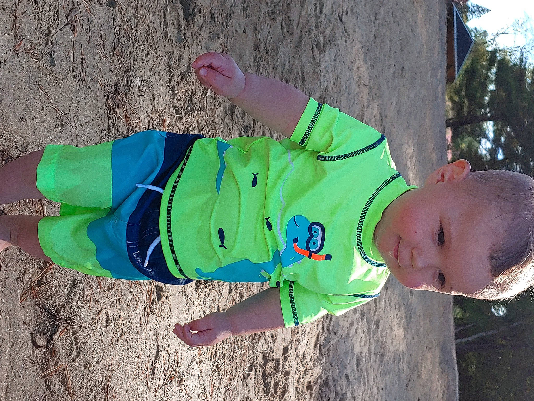 Brady is registered to the contest to win money with this photo: baby, baby_toddler_clothing, child, electric_blue, fun, grass, happy, leisure, pattern, people_in_nature, person, play, sleeve, soil, toddler, tree, winter