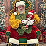 Nova joined the competition — help win amazing prizes! santa_claus, baby, christmas, holiday, festive, chair, ornate, red_clothing, green_clothing, beard, hat, gloves, indoor, decorations, lights, gift_boxes, wooden_background, boots, smile, portrait