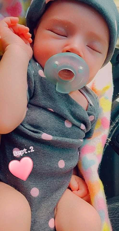 Madison is registered to the contest to win money with this photo: baby, baby_products, baby_toddler_clothing, cheek, chest, drinking, drinkware, eyelash, finger, gesture, happy, mouth, nail, nose, person, pink, skin, sleeve, thigh, thumb