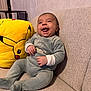 Noah participe au concours pour gagner de l'argent avec cette photo : baby, child, couch, cozy, cute, fabric, happy, home, indoor, infant, onesie, person, pikachu, plush, portrait, seated, smiling, soft_toys, toy, yellow