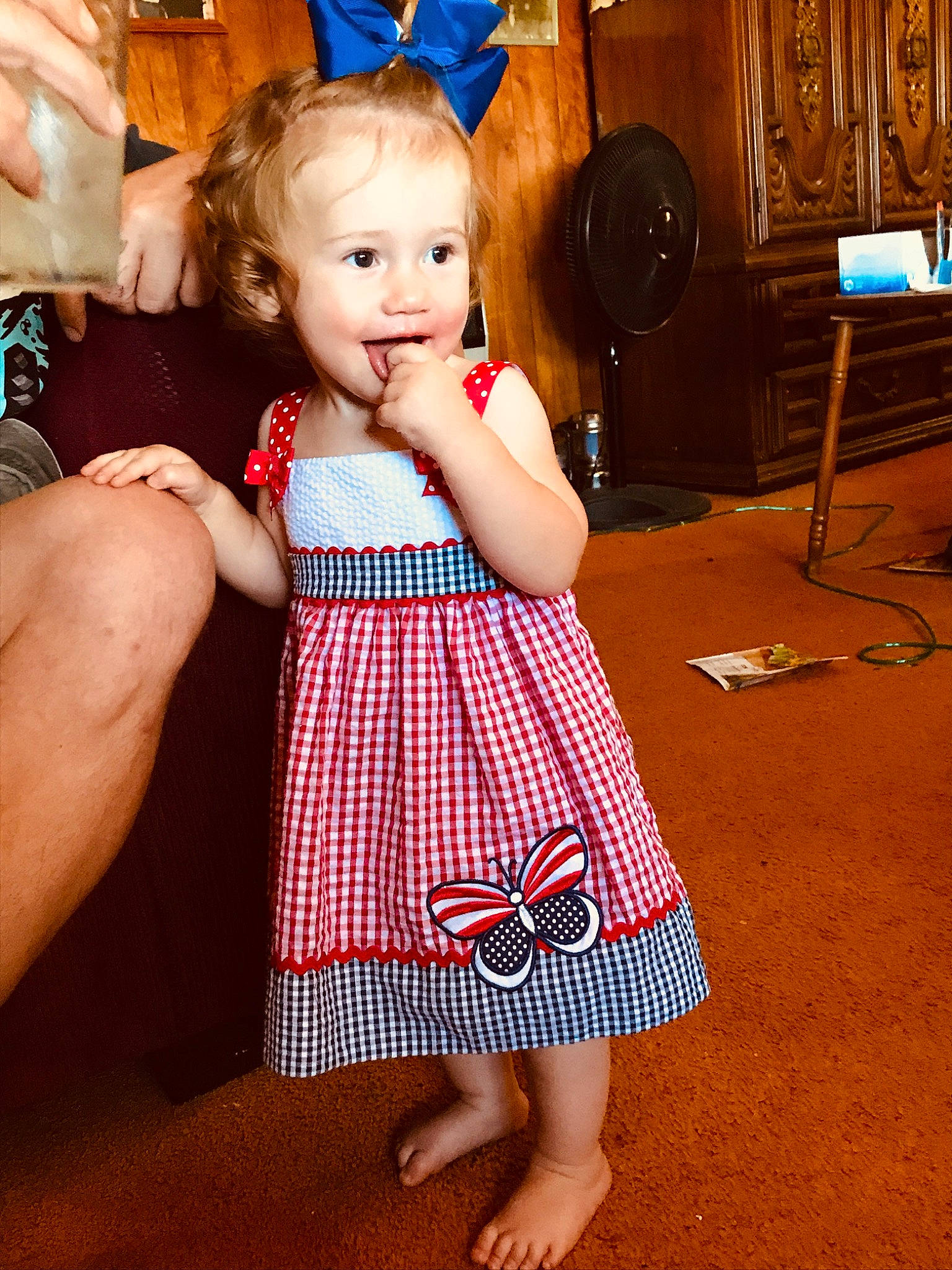 Lillie is registered to the contest to win money with this photo: baby_toddler_clothing, day_dress, dress, facial_expression, finger, gesture, hairstyle, happy, head, human_body, iris, leg, one_piece_garment, organ, person, pink, shoulder, skin, smile, standing