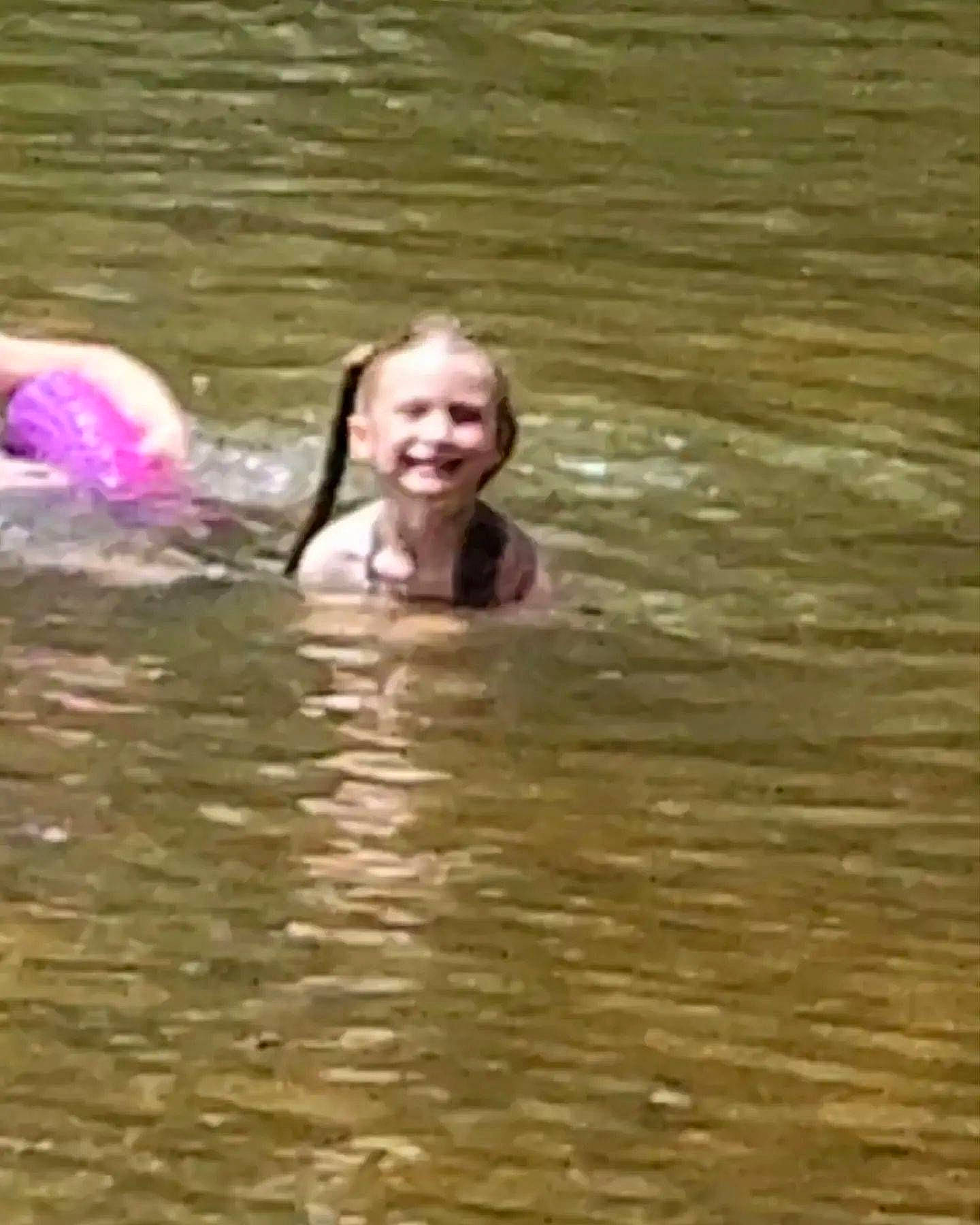 Callie joined the competition — help win amazing prizes! bathing, child, fun, happy, hardwood, individual_sports, joy, lake, leisure, liquid, person, personal_protective_equipment, recreation, smile, sports, swimwear, toddler, water, wave, wood