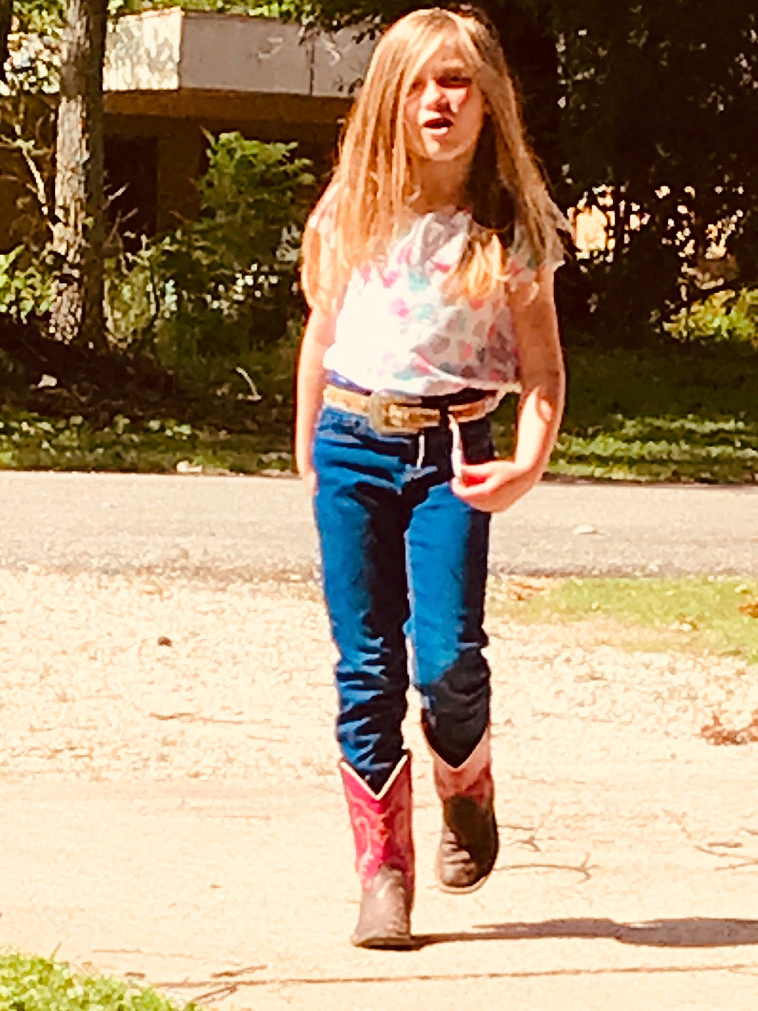 Callie joined the competition — help win amazing prizes! blond, clothing, denim, electric_blue, eyewear, fashion_design, fashion_model, grass, human_leg, knee, leather_jacket, pattern, person, plaid, plant, sleeve, sportswear, t_shirt, thigh, tree