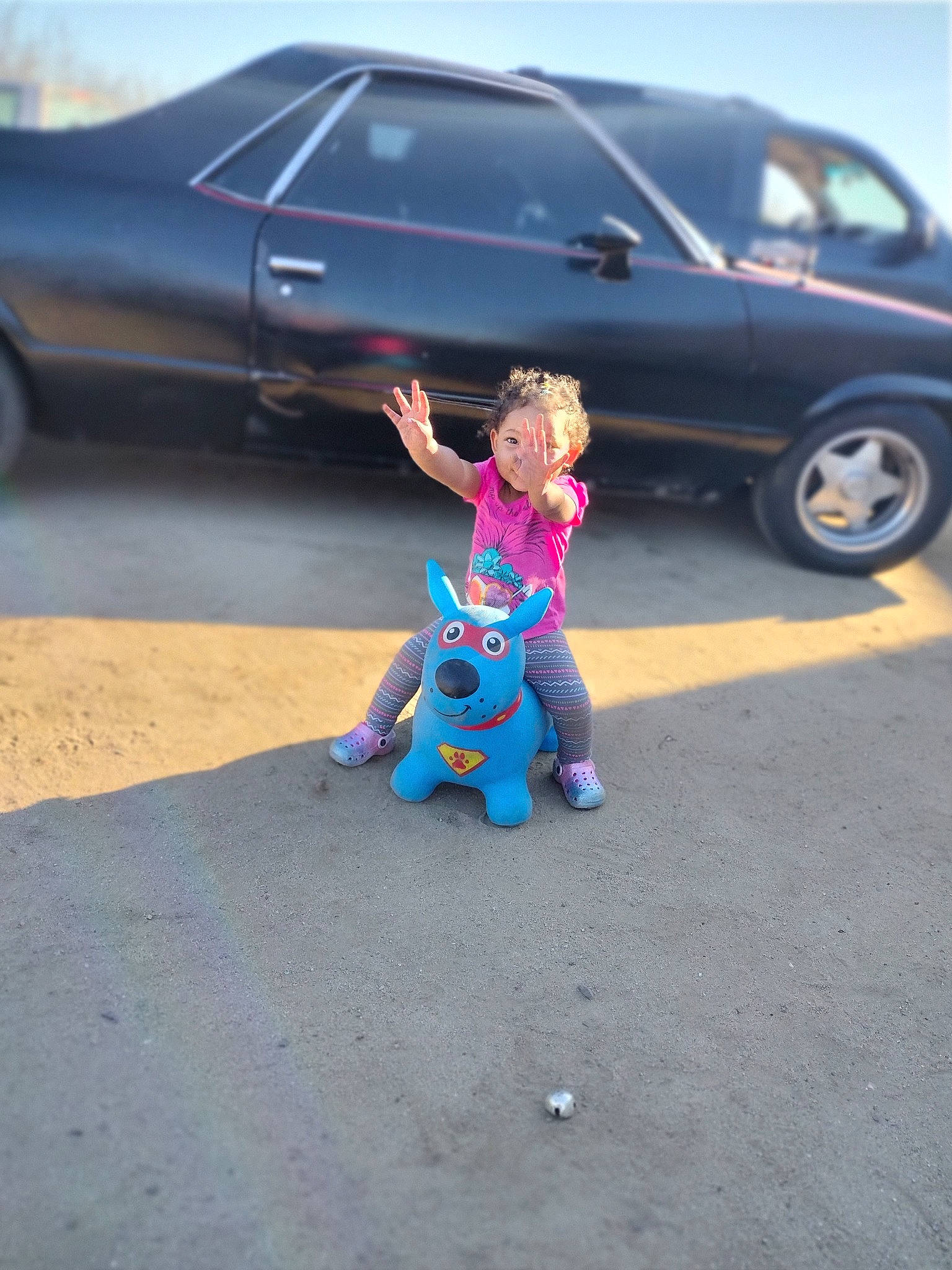 Wednesday is registered to the contest to win money with this photo: alloy_wheel, asphalt, automotive_design, automotive_exterior, automotive_lighting, automotive_tire, automotive_wheel_system, bumper, car, fender, hood, land_vehicle, motor_vehicle, person, personal_luxury_car, road, tints_and_shades, tire, vehicle, vehicle_door