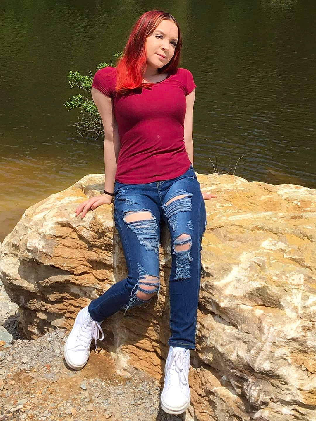 Brianna joined the competition — help win amazing prizes! denim, flash_photography, footwear, hair, happy, jeans, knee, leisure, long_hair, people_in_nature, person, shoe, smile, sneakers, street_fashion, sunlight, thigh, trunk, waist, water