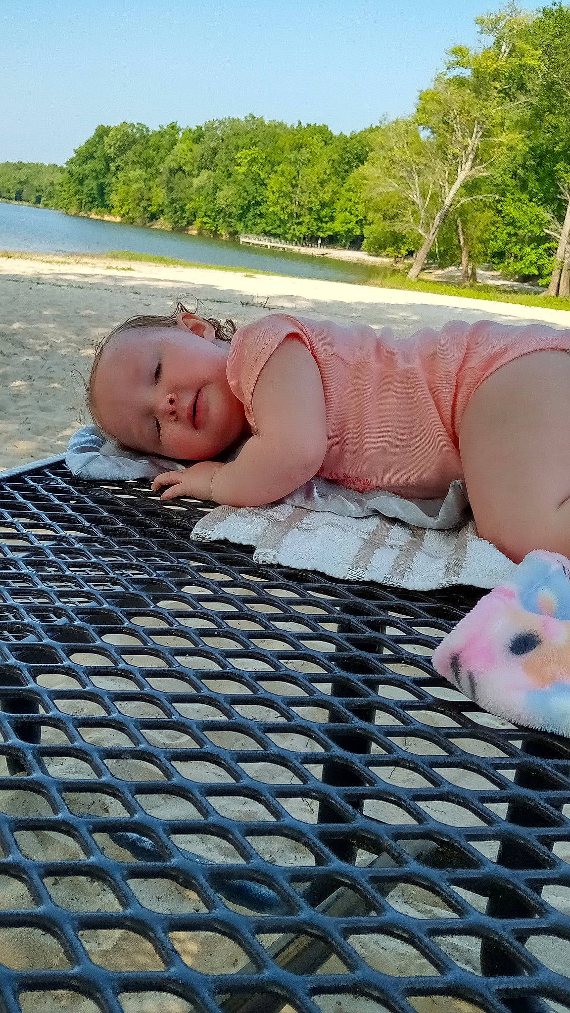Layla is registered to the contest to win money with this photo: baby, child, comfort, eye, flooring, fun, grass, happy, leisure, muscle, person, plant, skin, sky, summer, thigh, thumb, toddler, tree, water