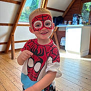 Jack-junior joined the competition — help win amazing prizes! child, boy, face_paint, spiderman, costume, smiling, indoors, wooden_floor, window, natural_light, shirt, shorts, happy, person, playful, home, wooden_wall, casual_clothing, portrait, standing