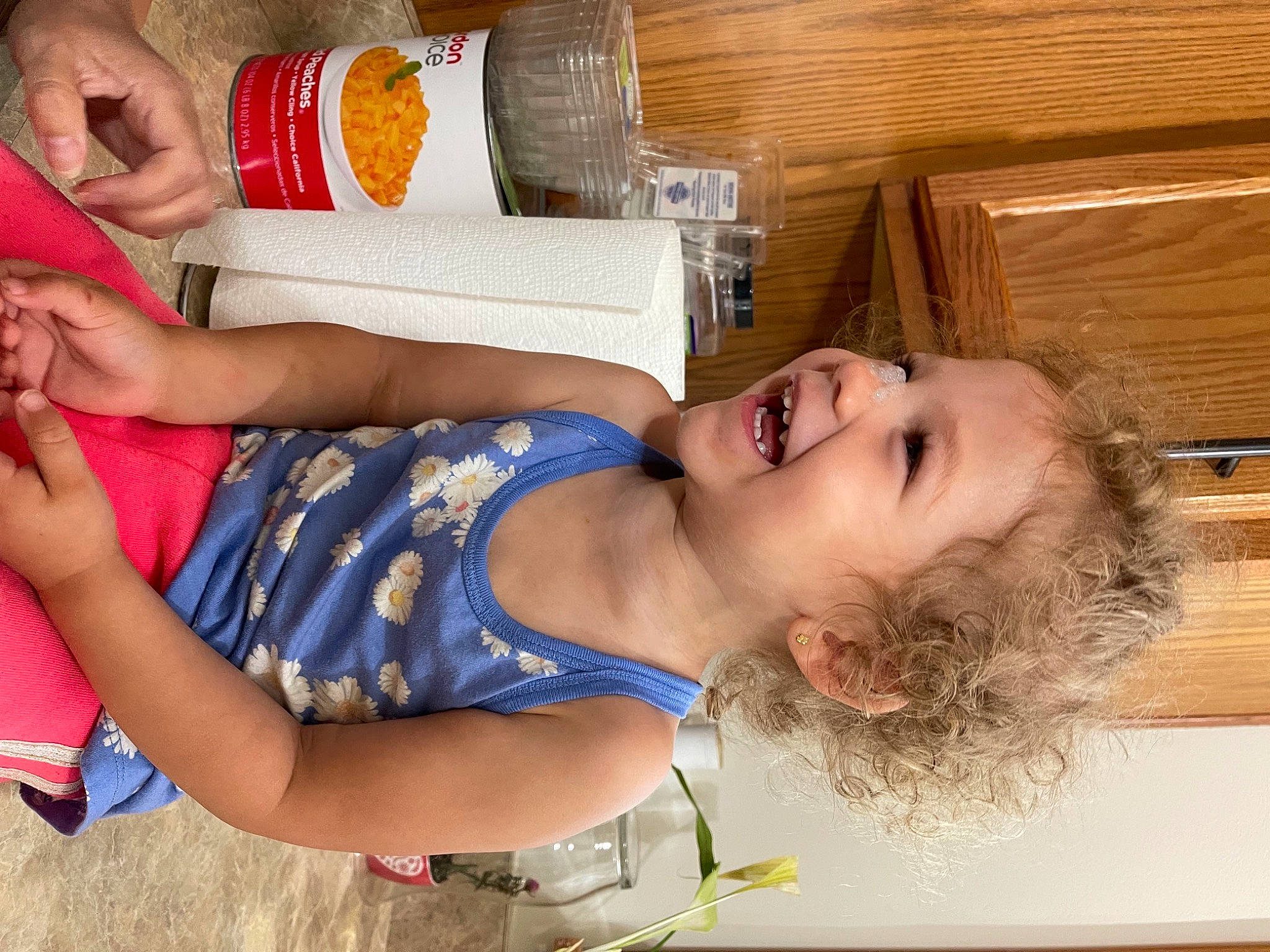 Ellianna is registered to the contest to win money with this photo: abdomen, chest, elbow, electric_blue, fun, hand, happy, human_leg, joint, leg, leisure, muscle, orange, person, smile, textile, thigh, trunk, waist, wood