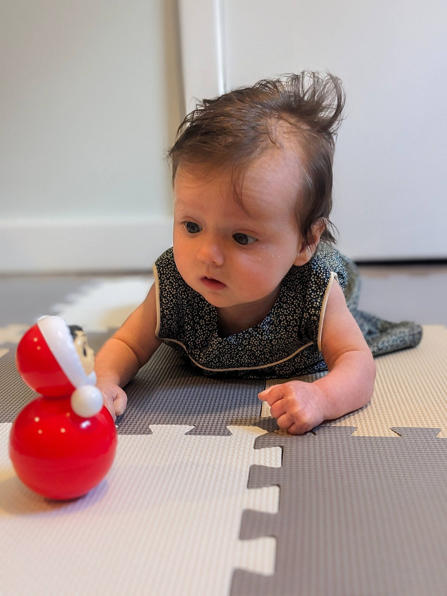 Natalie joined the competition — help win amazing prizes! baby, baby_playing_with_toys, baby_products, baby_toddler_clothing, bath_toy, carmine, child, cleanliness, crawling, finger, floor, flooring, fun, happy, hardwood, leisure, person, sitting, surprise, toddler