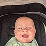 Mateo joined the competition — help win amazing prizes! baby, bib, child, clothing, cute, eyes, fabric, face, happy, head, indoors, infant, mouth, person, portrait, seat, skin, smiling, stroller, young
