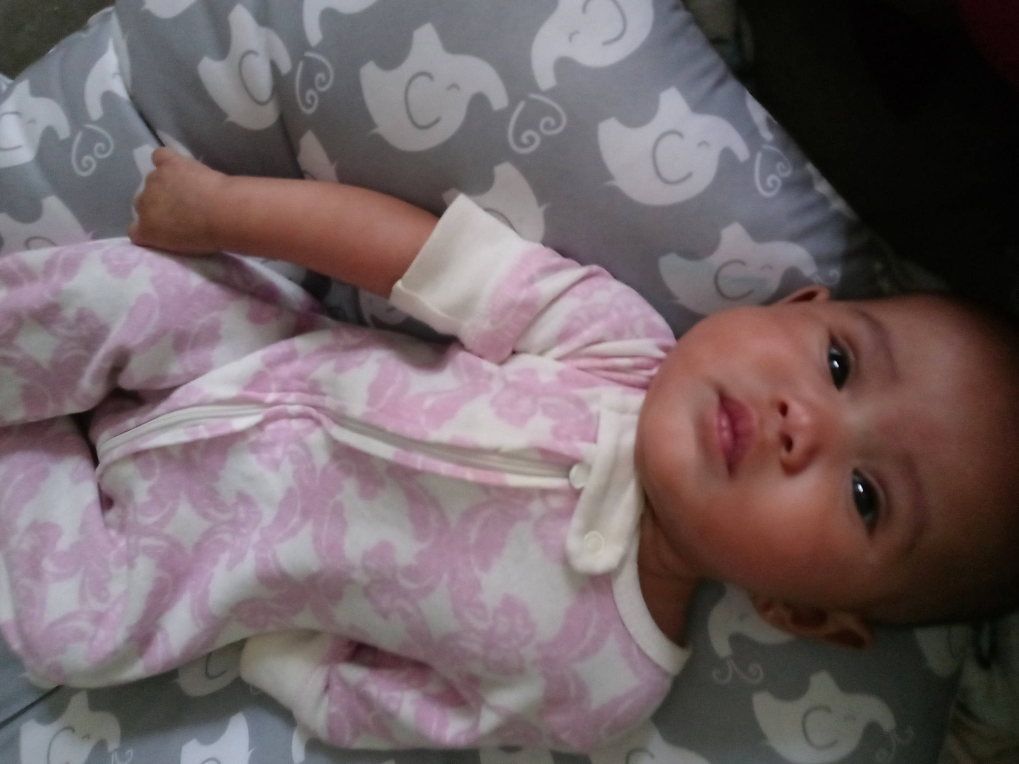 Belle is registered to the contest to win money with this photo: arm, baby, baby_toddler_clothing, beauty, cheek, child, comfort, eyelash, finger, hand, linens, lip, magenta, pattern, person, pink, product, skin, sleeve, textile