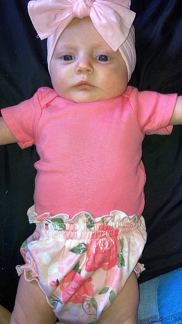 Claire joined the competition — help win amazing prizes! baby, baby_carriage, baby_toddler_clothing, cap, cheek, child, eye, face, happy, headwear, human_body, linens, lip, magenta, mouth, person, pink, skin, sleeve, t_shirt