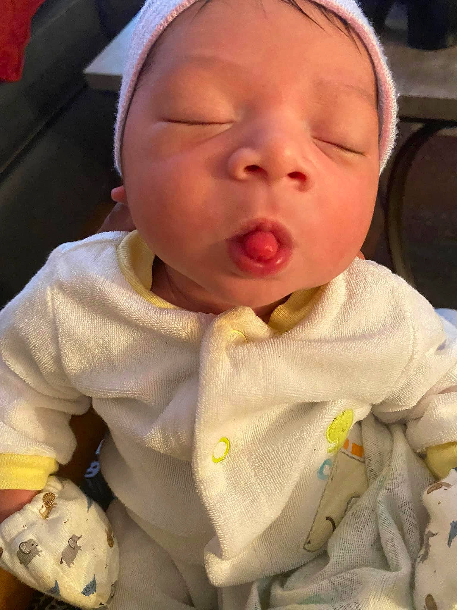 Messiah is registered to the contest to win money with this photo: baby, baby_products, baby_sleeping, baby_toddler_clothing, carmine, cheek, child, comfort, eyelash, facial_expression, happy, lip, mouth, nose, person, product, skin, sleeve, textile, thumb