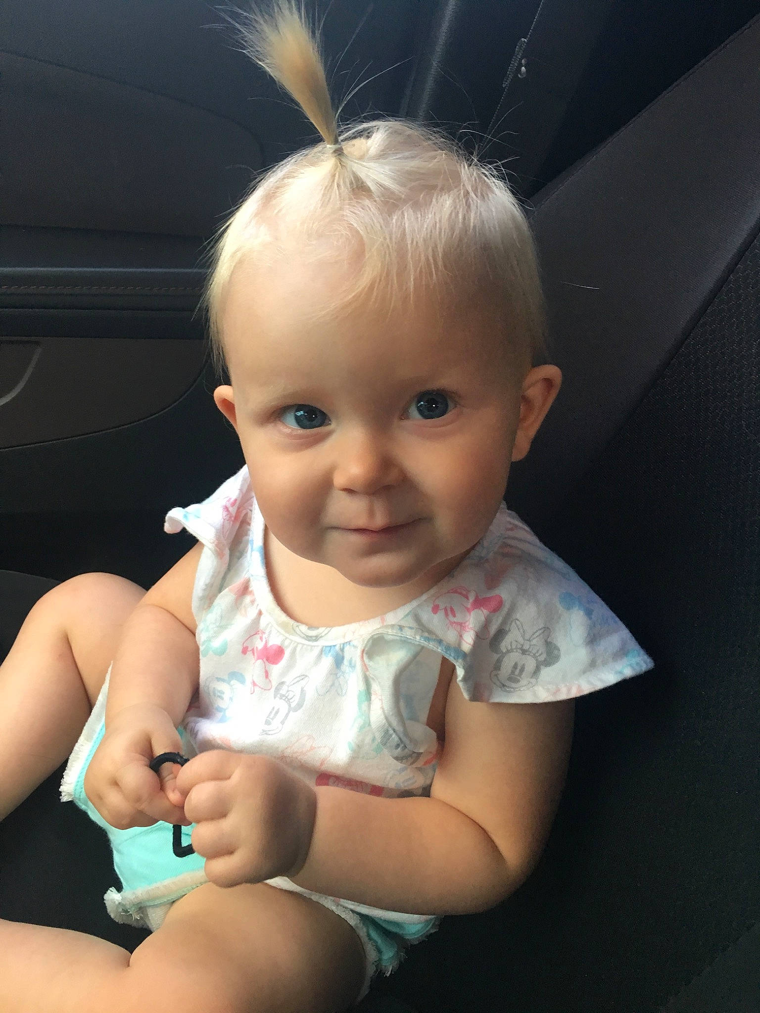 Bellarose is registered to the contest to win money with this photo: arm, baby, blond, cheek, child, chin, eye, face, facial_expression, forehead, hair, hairstyle, head, lip, nose, person, sitting, skin, smile, summer