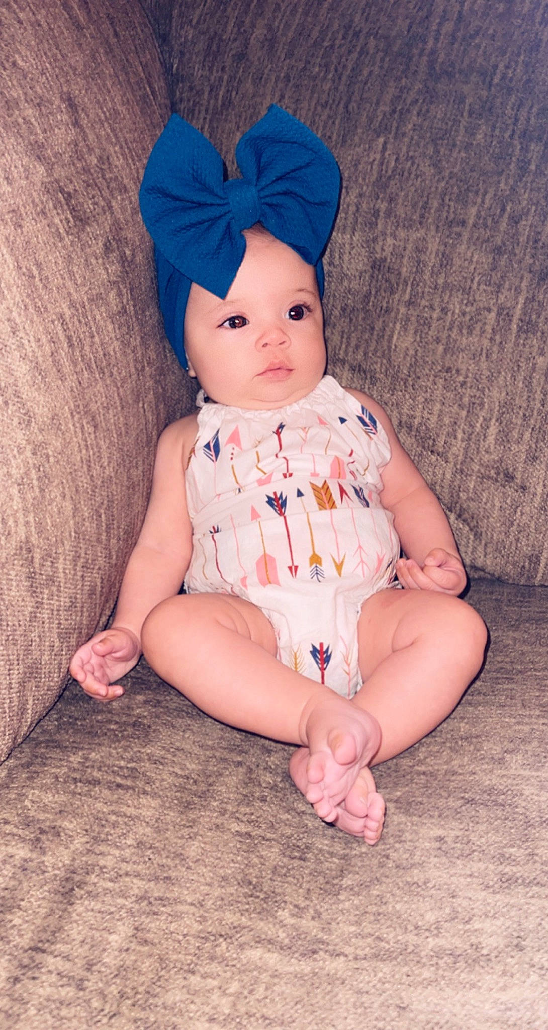 Skylynn is registered to the contest to win money with this photo: baby, baby_toddler_clothing, beanie, cap, cheek, child, doll, eye, fashion_accessory, foot, head, headwear, human_leg, iris, peach, person, sitting, sleeve, thigh, toddler