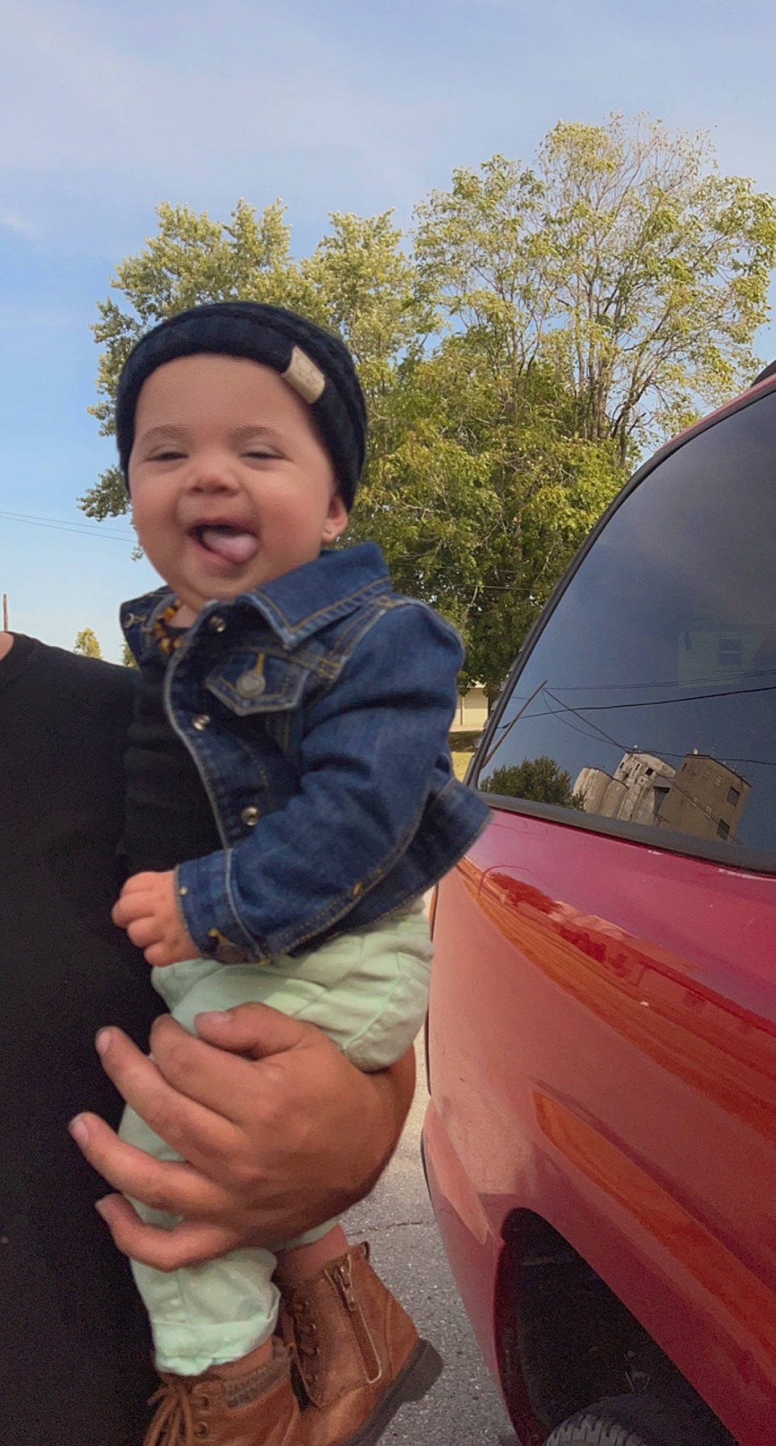 Skylynn joined the competition — help win amazing prizes! automotive_design, automotive_exterior, automotive_lighting, automotive_tire, automotive_wheel_system, bumper, car, cool, fender, grass, hat, headwear, hood, leaf, motor_vehicle, person, sky, tints_and_shades, toddler, tree