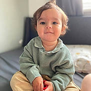 Kodi joined the competition — help win amazing prizes! baby, blonde, bodypart, clothing, face, finger, hair, hand, happy, head, knitwear, longsleeve, pants, person, photography, portrait, sitting, sleeve, smile, sweater