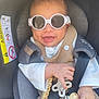 Sasha a rejoint le concours — aidez-le/la à gagner de superbes lots ! accessories, baby, belt, clothing, coat, face, glasses, happy, hat, head, jacket, jewelry, necklace, pants, person, photography, portrait, sunglasses, transportation, vehicle