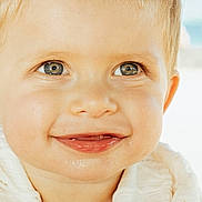 Sasha participe au concours pour gagner de l'argent avec cette photo : toddler, child, face, blue_eyes, smile, happy, close_up, skin, hair, white_sweater, baby, cute, portrait, innocence, young_child, expression, joy, warm_light, outdoor, natural_light