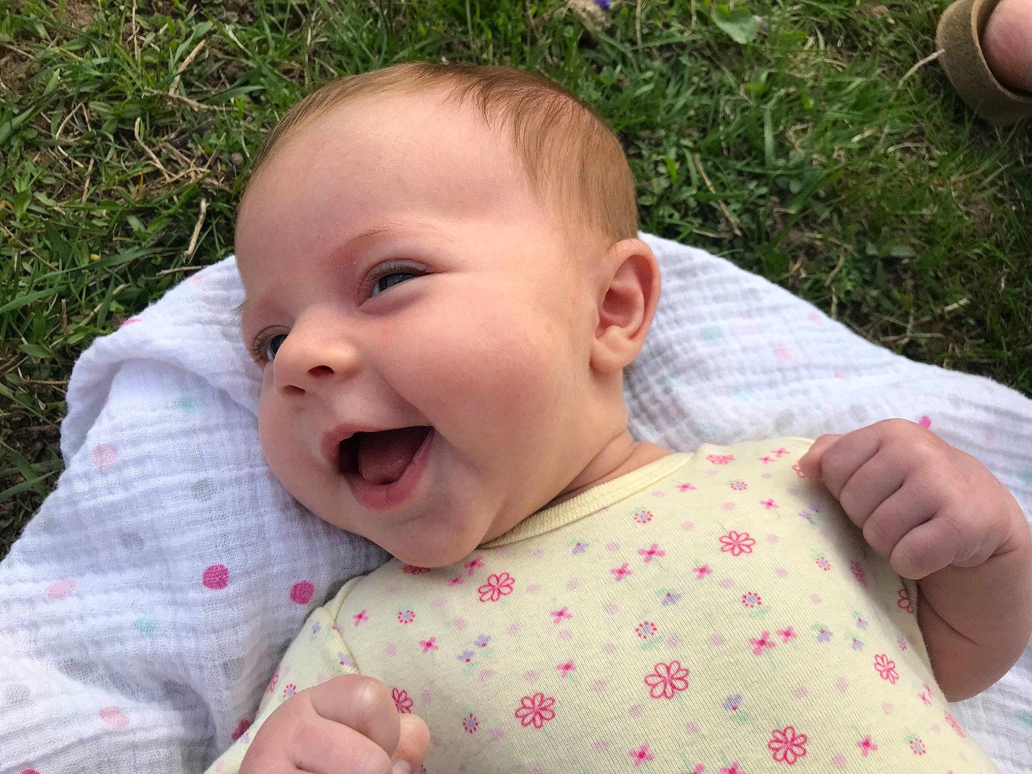 Zahra joined the competition — help win amazing prizes! baby, baby_making_funny_faces, cheek, child, ear, face, facial_expression, finger, gesture, grass, hand, happy, head, laugh, lip, mouth, nose, person, skin, smile