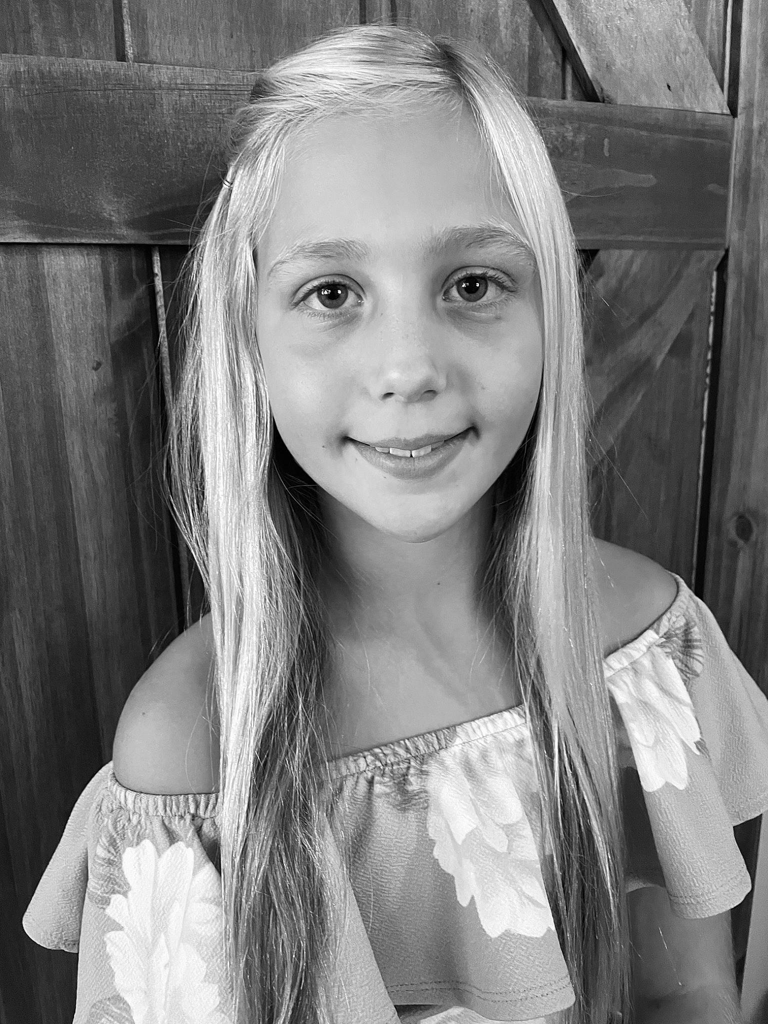 Kaylee Saumer is registered to the contest to win money with this photo: black, black_and_white, eye, eyelash, face, facial_expression, fashion, flash_photography, hair, hairstyle, happy, head, iris, jaw, joy, lip, organ, person, photograph, skin