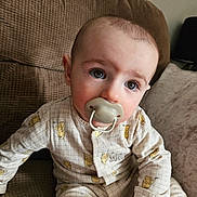 Romeo joined the competition — help win amazing prizes! baby, biting, bodypart, couch, cushion, cutlery, eating, face, finger, food, furniture, hand, head, homedecor, linen, person, photography, portrait, sitting, spoon