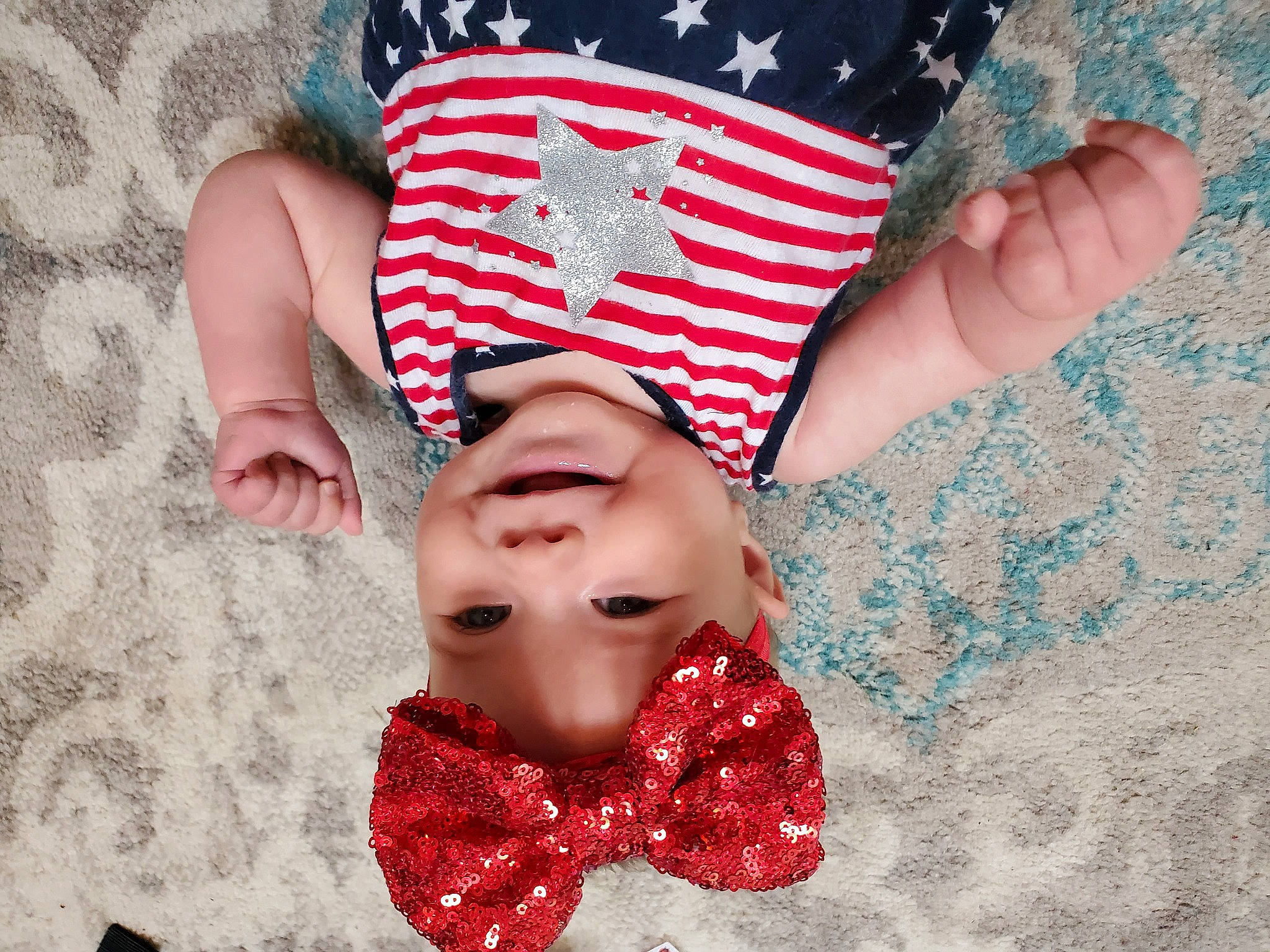 Lorelai joined the competition — help win amazing prizes! barefoot, child, eyelash, finger, flag_of_the_united_states, font, foot, fun, gesture, happy, headgear, headwear, human_leg, joy, nail, pattern, people_in_nature, person, red, sleeve